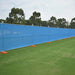 Temp-fence--with-blue-shade-cloth-fence-with-orange-feet