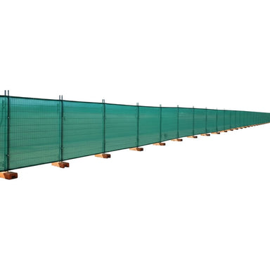 temporary fence with green shade cloth